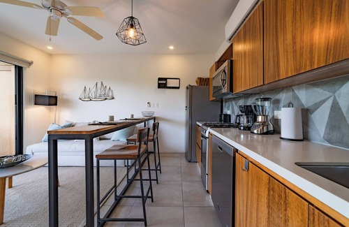 P Chahue Condo | Chic Central Living: 1-Bedroom Condo Rental in Prime Location