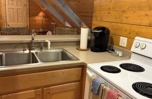 Wiley House | Chic & Comfy Suite & Covered Blue Stone Patio with Fireplace & Waterfall View