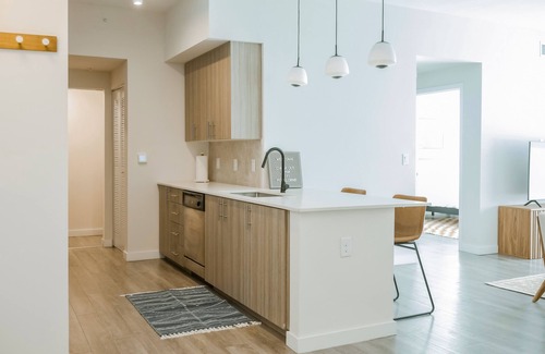 Miami Gardens Condo | Chic, dog-friendly condo with tropical pool, fitness center & great location
