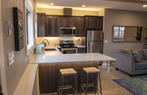Genesee Apartment | Chic Flat -Easy Transit to Stadiums+Downtwn & renovated shared backyard oasis!