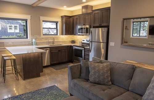 Genesee Apartment | Chic Flat -Easy Transit to Stadiums+Downtwn & renovated shared backyard oasis!