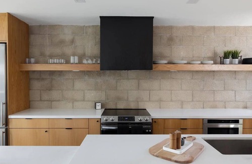 Middletown Condo | Chic Little Italy Home w AC, Location and a Private Studio w patio