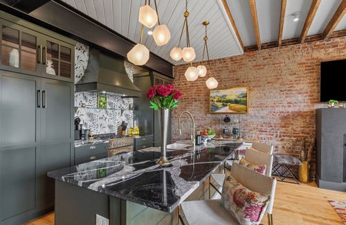 Burnsville Condo | Chic Loft in Downtown Burnsville! Walk to all shops and restaurants!