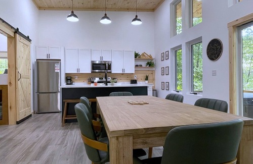 Campton Cabin | Chic modern cabin in a magical forest. Hot Tub, Swinging Bed, WiFi, & EV Charger