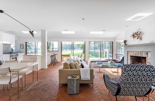 Hay Beach House | Chic modern mid century home with saltwater pool and expansive views