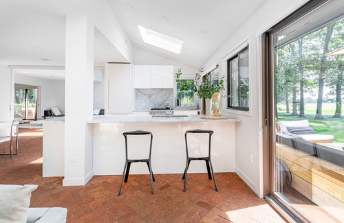 Hay Beach House | Chic modern mid century home with saltwater pool and expansive views