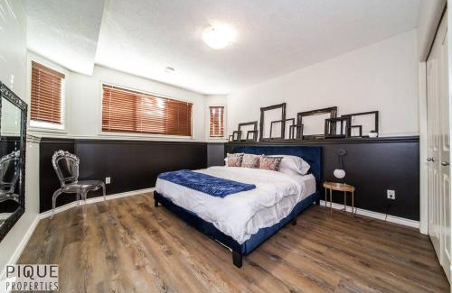 Jasper Place Apartment | Chic Modern Vibes - KING Bed - Fireplace - Sleeps 4 - Wifi