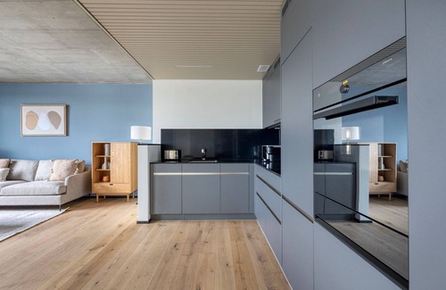 Seebach Apartment | Chic Oerlikon 1BR w/Storage & W/D, nr Market & Tram, by Blueground
