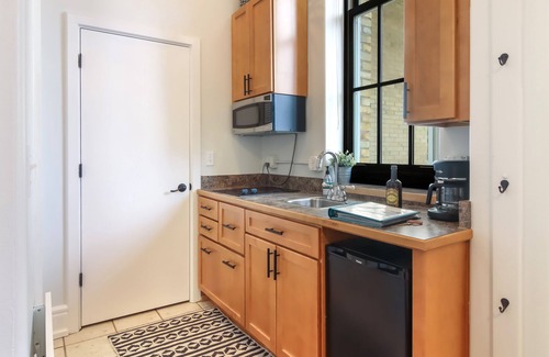 Traverse City Condo | Chic Studio in Historic Village~Walk to Restaurants, Shops, and Trails!
