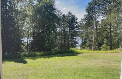 Stambaugh House | Chicaugon Lake home close to great golf and fishing opportunities.