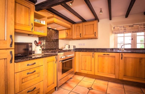 Eastbourne House | Chocolate-box pretty Pear Tree Cottage in South Downs village