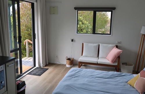 Diamond Harbour Cottage | Church Bay cabin: sunny, great views