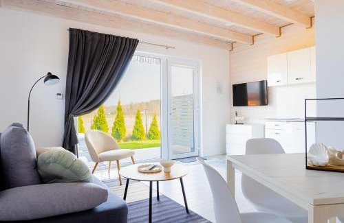 Karwienskie Bloto Drugie Apartment | Cichy Domek Apartamenty - Podgrzewany Basen, Jacuzzi, Plac Zabaw, Parking - Cicha i Spokojna Lokalizacja