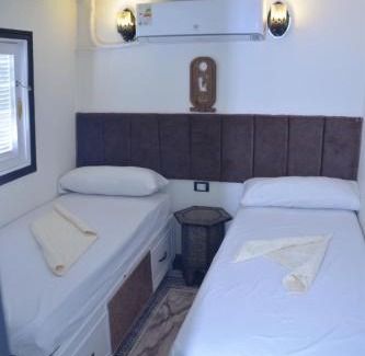 Shurtah al-Dakhlah Hotel | Cinderella Malika boat