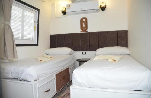 Shurtah al-Dakhlah Hotel | Cinderella Malika boat