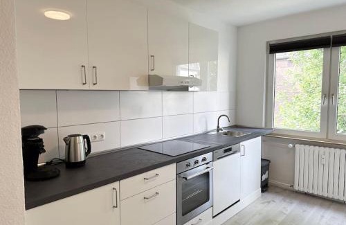 Frohnhausen Apartment | City Apartment with WIFI, Kitchen and 4K TV
