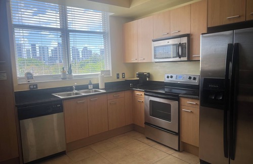 Overtown Condo | City Centric 1 bed, 1 bath, sleeps up to 3, secure w/pool & assigned parking!