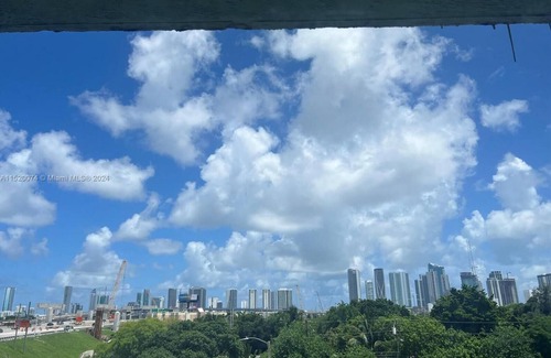 Overtown Condo | City Centric 1 bed, 1 bath, sleeps up to 3, secure w/pool & assigned parking!