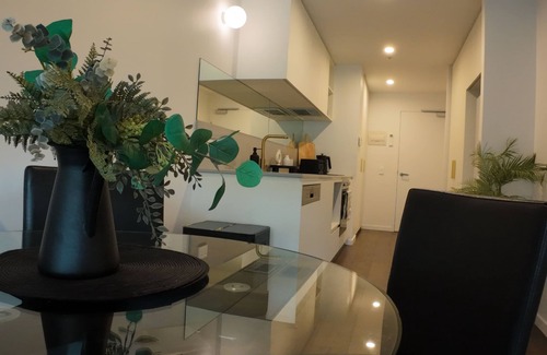 Reid Apartment | City Retreat with Rooftop Pool, Private Parking & City Views