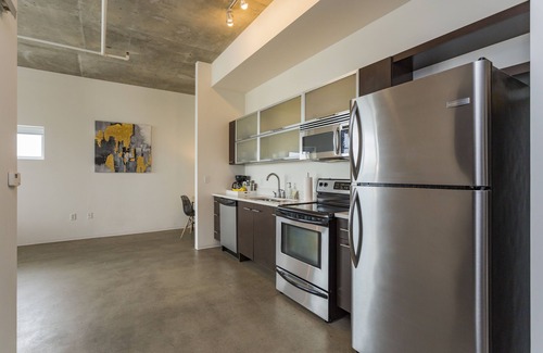 East Nashville Condo | City Views with Floor to Ceiling Windows