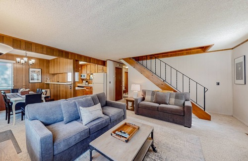 Tahoe Island Cabin | Classic central cabin near river with large tree-lined deck, grassy yard & gym