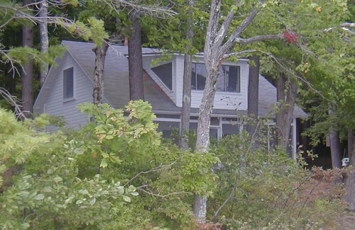 Holderness Cottage | Classic Cottage With Screened Porch And Sandy Beach