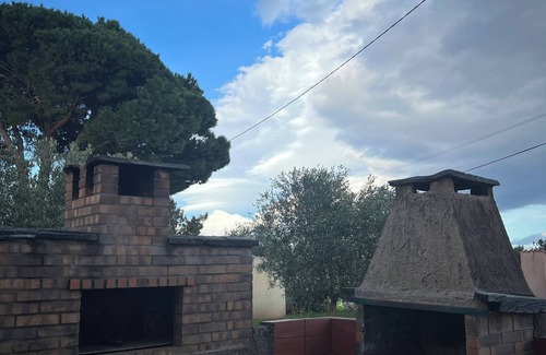 Lucciana House | Classic elegance and timeless charm: Maison de Caractère with garden