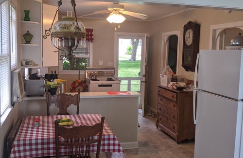 Markesan Cottage | Classic Green Lake cottage, lakefront, screened boathouse deck, dock, swimming