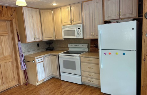 Barndoor Island House | Classic Lake Winnipesaukee Camp with Breathtaking Views