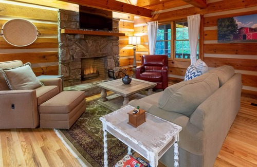 Cherokee Cabin | Classic log cabin home in private community - large porch & fireplace