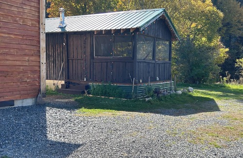 Columbia Cabin | Classic original cedar log cabins set on Simms Stream in the North East Kingdom.