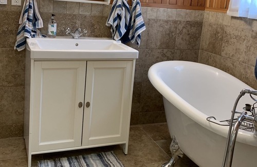 Abbotsford House | Clayburn Village, comfortable character brick home