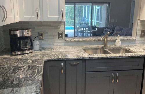 Dunnellon House | Clean and modern home, sparkling heated pool, near river