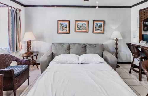 Damas Condo | Clean & Bright Getaway W/ Shared Pool, Lush Gardens, & Ideal Location Near Town!