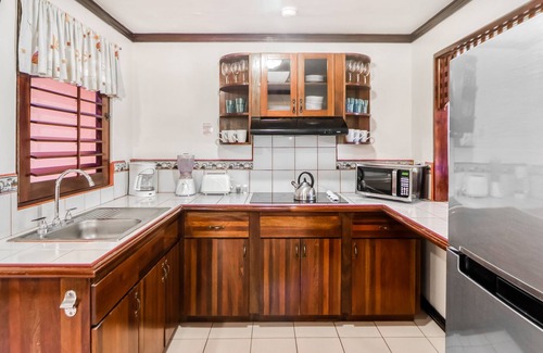 Damas Condo | Clean & Bright Getaway W/ Shared Pool, Lush Gardens, & Ideal Location Near Town!