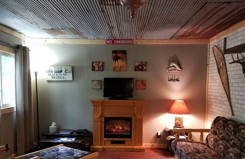 Wellston Cabin | Clean, comfortable cabin within walking distance to Tippy Dam!