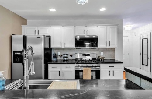 Blasdell House | Clean,Cozy &Updated Home with Jacuzzi, Fenced in yard, BarShed, Firepit & MORE!