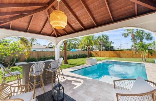 Hunt Club House | Clean Florida Coastal Design home with Heated Pool, Fireplace and Putt Putt