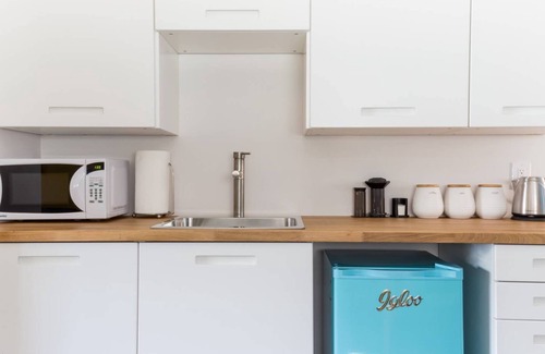 Whyte ave House | Clean Modern Comfort in Old Strathcona