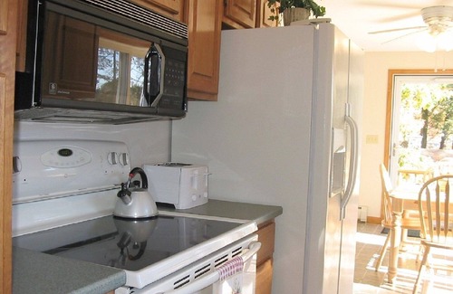 Winnisquam Condo | Clean, Sunny, Spacious Waterfront Condo With WiFi and Private Entrance
