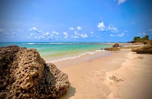 Kutani Ski Chalet | Cliffside Amani Wooden Villa with Stunning Ocean Views for an Authentic Tanzanian Escape