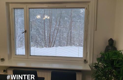 Hasselby Apartment | Close to the metro and the beach! with a view of the Scandinavian forest