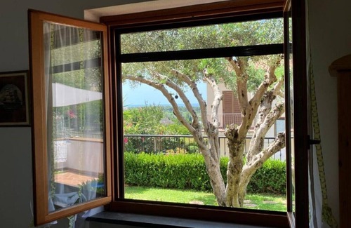 Marina di Maratea Apartment | Close to the most convenient and breezy beach in Maratea, with garden and terrace.