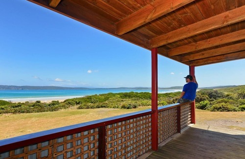 South Bruny Cabin | Cloudy Bay Cabin - Sometimes, the simplest pleasures in life are the best. This sums up Cloudy Bay Cabin; an unpretentious and welcoming little timber cottage surrounded by South Bruny National Park and just metres from the shores of beautiful Cloudy