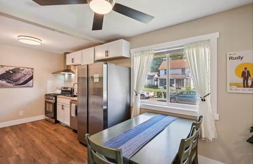 Northeast South Bend House | Clover Cottage Walk to Notre Dame, Game Room, Enclosed Porch, 3 queen beds