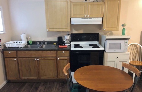 Chilliwack Proper Village West House | Coach house with outside seating area and Kitchen facilities. No-1