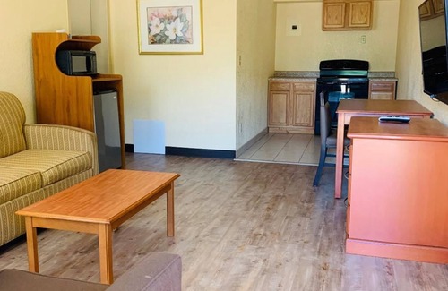 Magnolia Hotel | Coachman's Inn