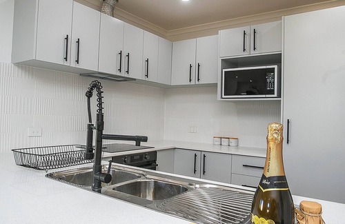 Clarkson House | Coast Luxury Modern Retreat or for Insurance Claim