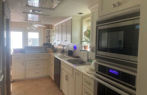 Bay Area House | Coastal 2-story home with pool & hot tub. Close to beaches, shops, and dining.