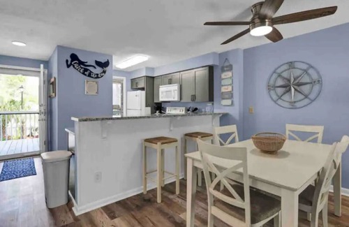 Kure Beach Condo | Coastal Breeze has private pools & beach accesses.